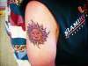 Smerking Sun tattoo
