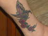 My ex-wifes butterfly with flowers tattoo