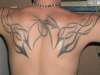 top back wrap tattoo