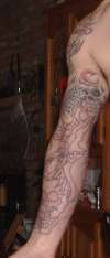 dragon and skulls tattoo