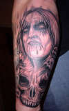MILOSCH FACE AND SKULLS tattoo