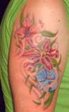 Bob Tyrrell tattoo cover up lotus and  flowers