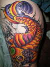 koi with color, half way done tattoo