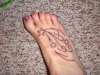 Foot- stars n swirls tattoo