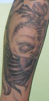 baby screw tattoo