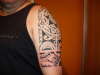 left arm tattoo