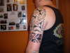 maori left arm tattoo