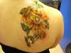 a cover up.. a memorial for 2 frends that have passed tattoo