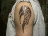 upper shoulder tattoo