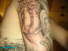 hand with brains ,  ron meyers tattoo