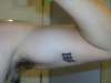 'M' tattoo