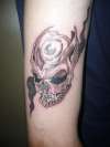 One eyed skull tattoo