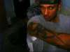 right arm covered with a sun god tribal tattoo
