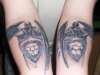 angels..... wings wrap around arm tattoo