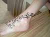 ankle tat tattoo