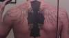 black cross with wings tattoo