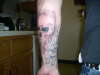 johns arm again tattoo