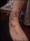 Butterfly on ankle tattoo
