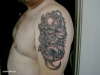skull on arm tattoo
