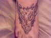 dragons head tattoo