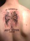 This is my first its a Cross w/ angel wings tattoo