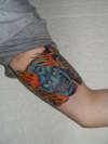 Inside arm Fudo mask tattoo