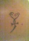 My First, Cross Heart tattoo