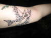 one eyed flying hand fish bird tattoo