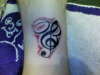 treble-clef tattoo