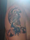 tribal zodiac tattoo