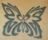 butterfly on lower back tattoo