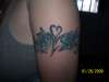 rose arm band tattoo