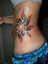 Tribal Sun tattoo