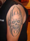 skull and tribal tattoo