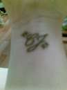 Wrist Initials tattoo