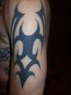tribal- left arm tattoo
