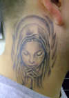 Virgin mary tattoo