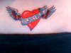heart on lower back tattoo