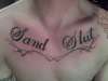 "Sand Slut" tattoo