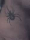 lita ford spider logo tattoo
