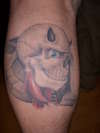 skull on a spade tattoo