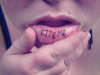 Inner lip tattoo