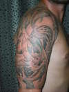 three fish swimming up the river tattoo