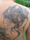 Intertwined Dragons tattoo