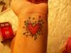 voodoo girl heart tattoo