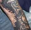 trippy tribal tattoo