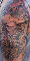 Snow Leopard tattoo