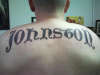 Last name on my back tattoo