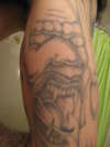 back inner bicep tattoo