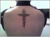 cross from the crown of thorns tattoo